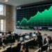 écran de cotation boursière affichant une hausse des indices en vert