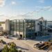 Usine de matériaux de construction avec courbe boursière en hausse en superposition